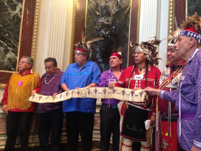 White House officials greet representatives of the Haudenosaunee Grand Council